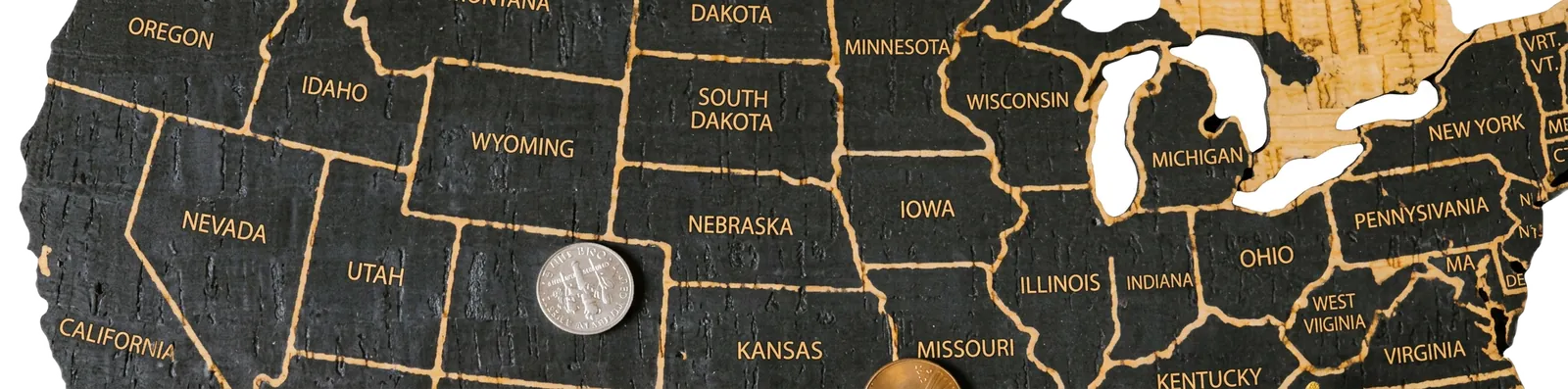 US state map with coins resting on it, illustrating sales tax rates that vary by state