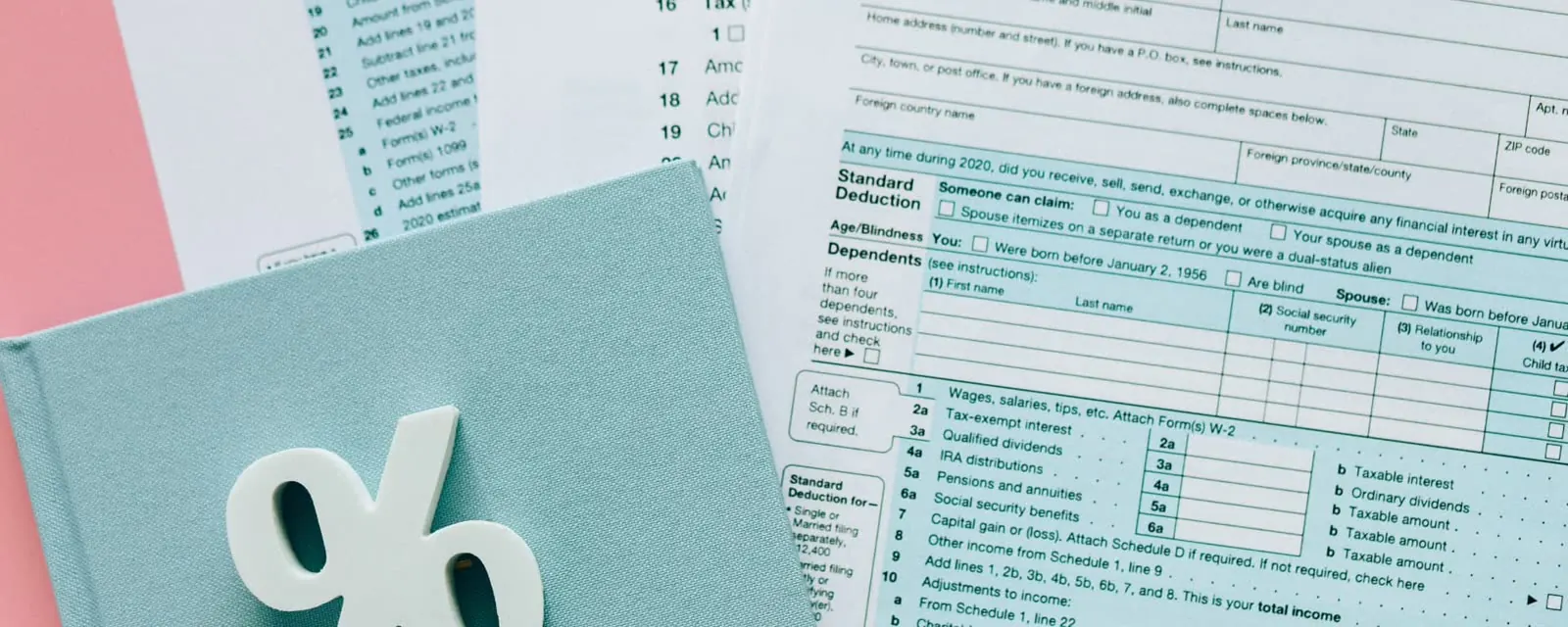 Two tax forms side by side with a percent sign, illustrating a city sales tax comparison